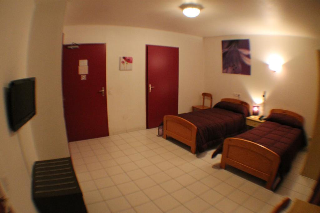 Hotel De La Pomme De Pin 뷰부코레방 객실 사진